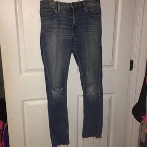 Medium wash distressed skinny jeans